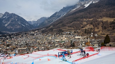A ski mountaineering race in Bormio, Italy, with a view of the comune in the background.