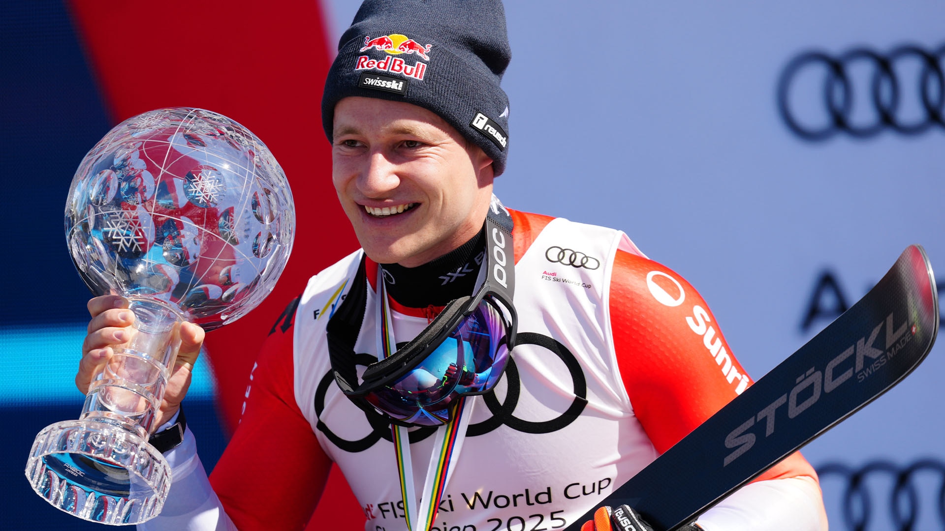 Marco Odermatt (SUI) celebrates with the Crystal Globe after the 2025 FIS Ski World Cup event at Sun Valley.