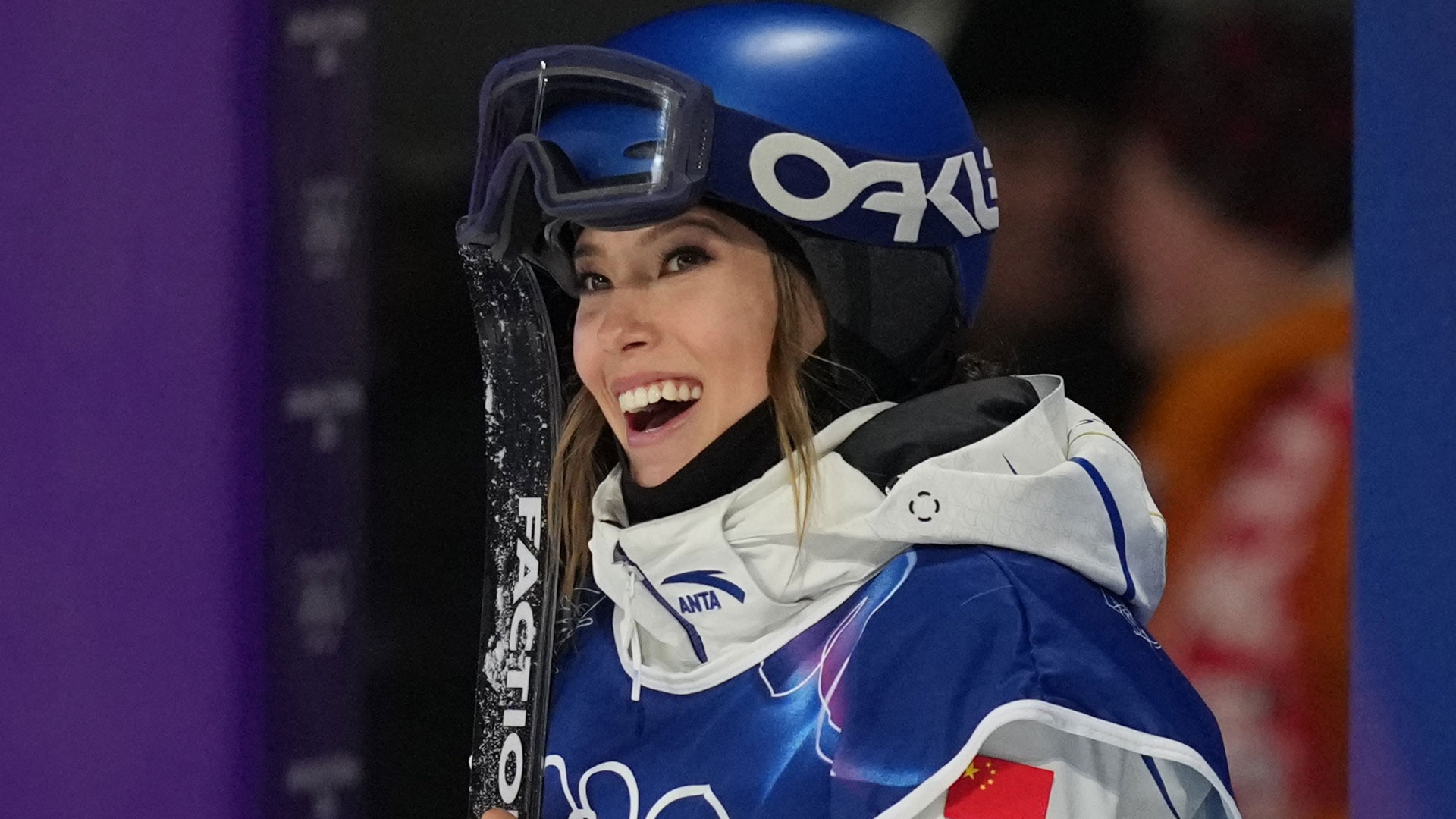 Eileen Gu smiles after competing in freeski big air qualifying