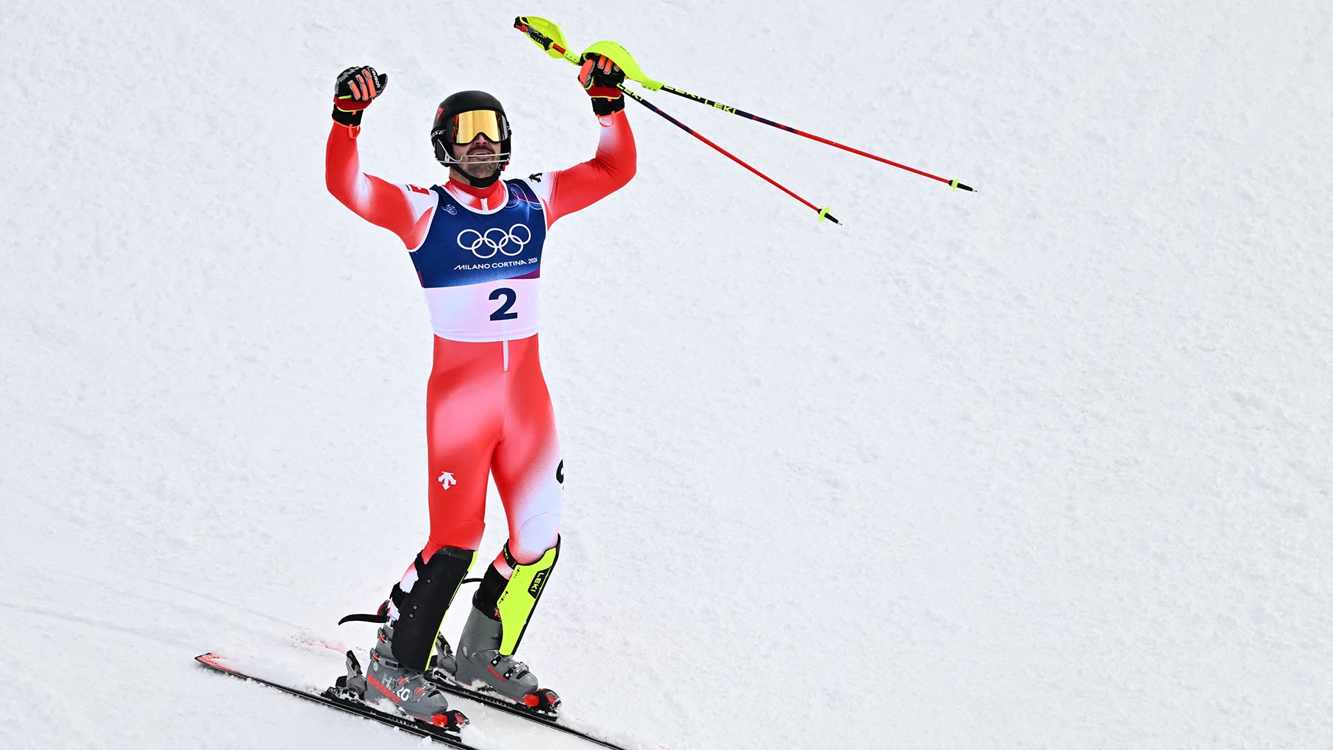 Loic Meillard (SUI) celebrates in the finish area after winning gold in the men's slalom event at Stelvio Ski Centre in Bormio.