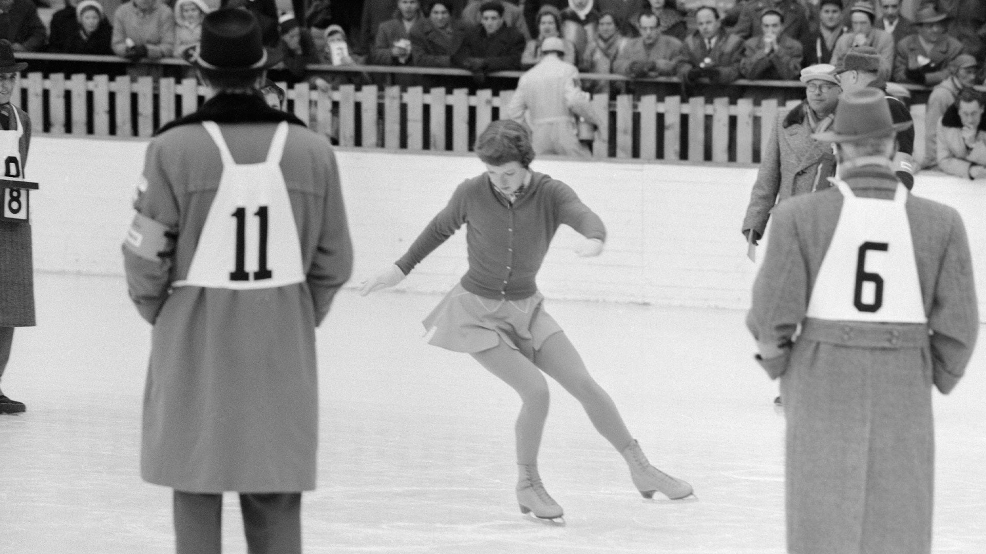 Tenley Albright is judged on the "figures" portion of her event.