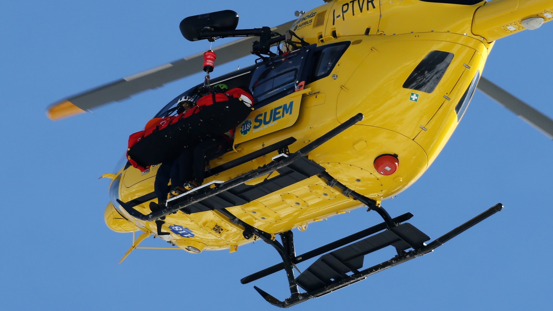 A mountain rescue helicopter is seen rescuing Lindsey Vonn of Team United States after she crashed during the Women's Downhill. 
