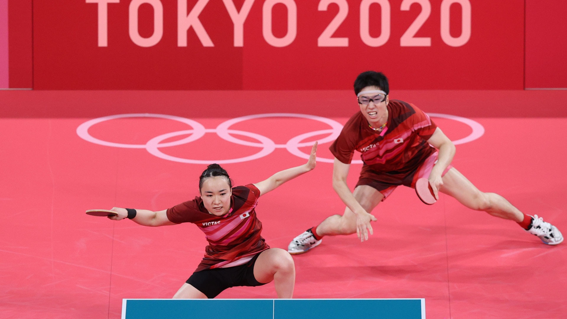 Japan's Ito Mima and Jun Mizutani compete in the table tennis mixed doubles gold medal match at the 2020 Tokyo Olympic Games on July 26, 2021.